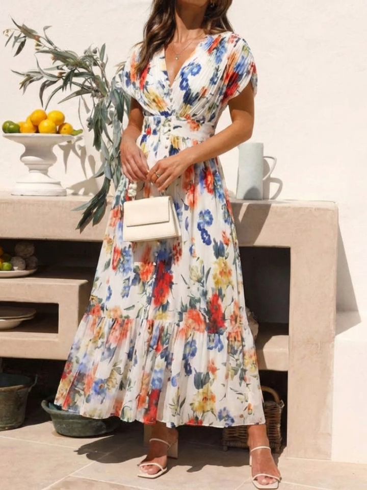 Małgorzata | Plisowana sukienka midi w kwiaty z krótkim rękawem